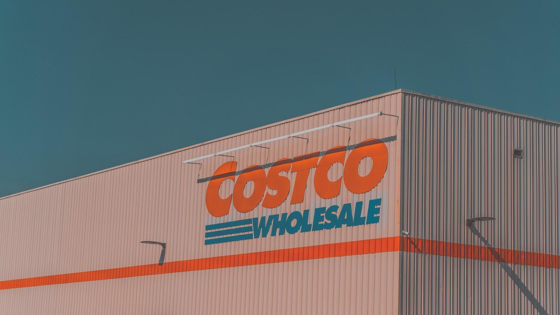 a building with a sign that says costco whole sale